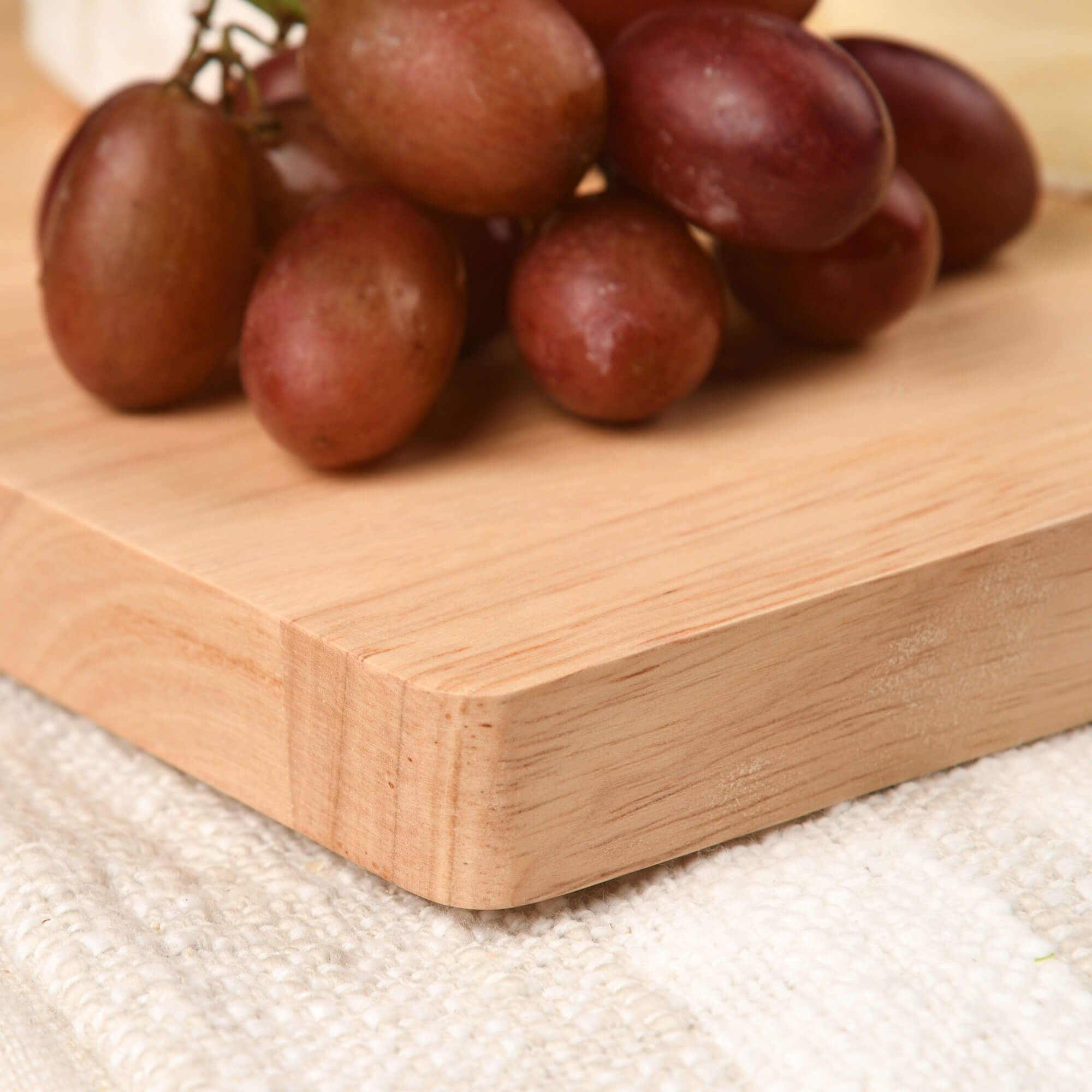 Closeup of corner of a maple cutting board