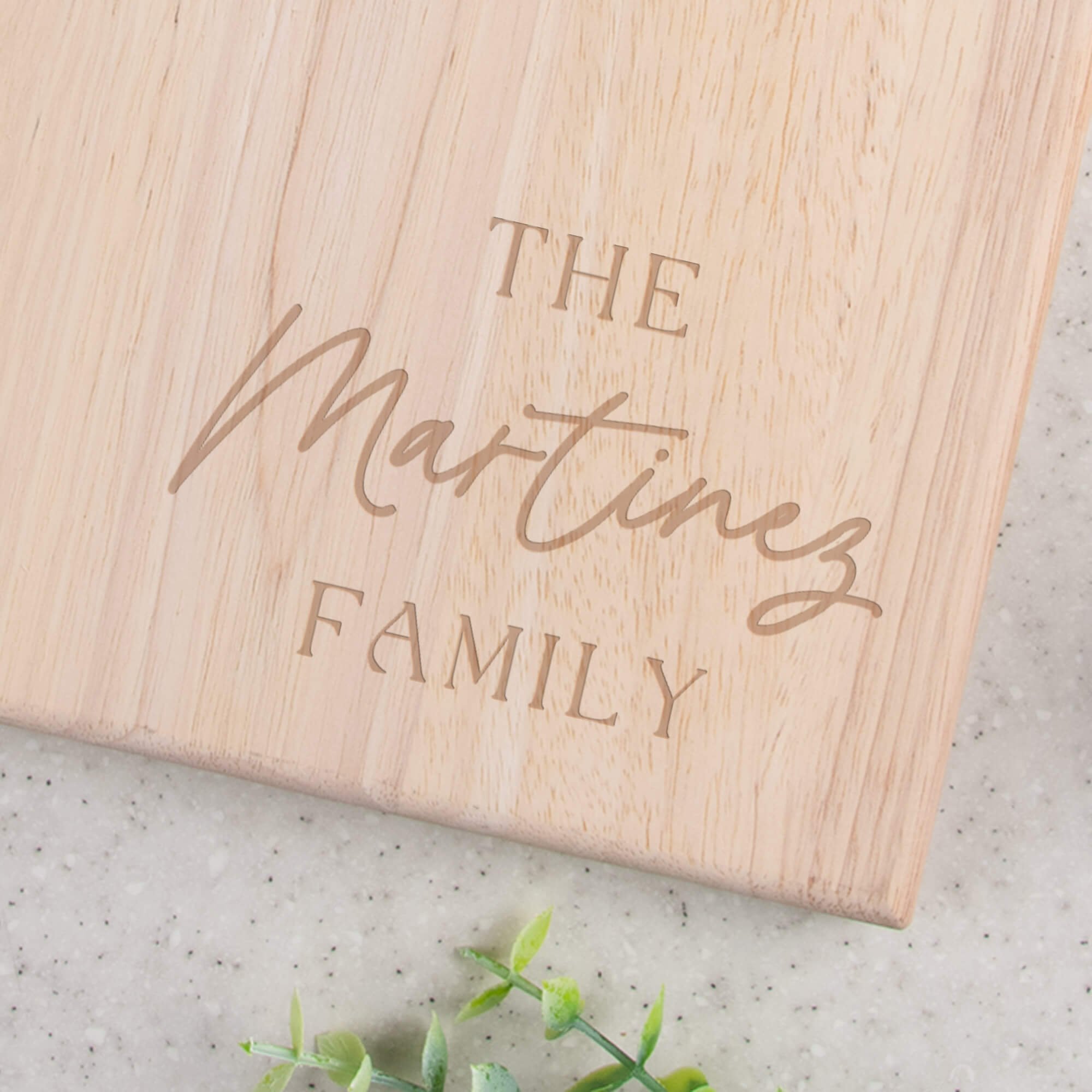 Personalized Family Script Paddle Serving Board closeup of design in bottom right corner