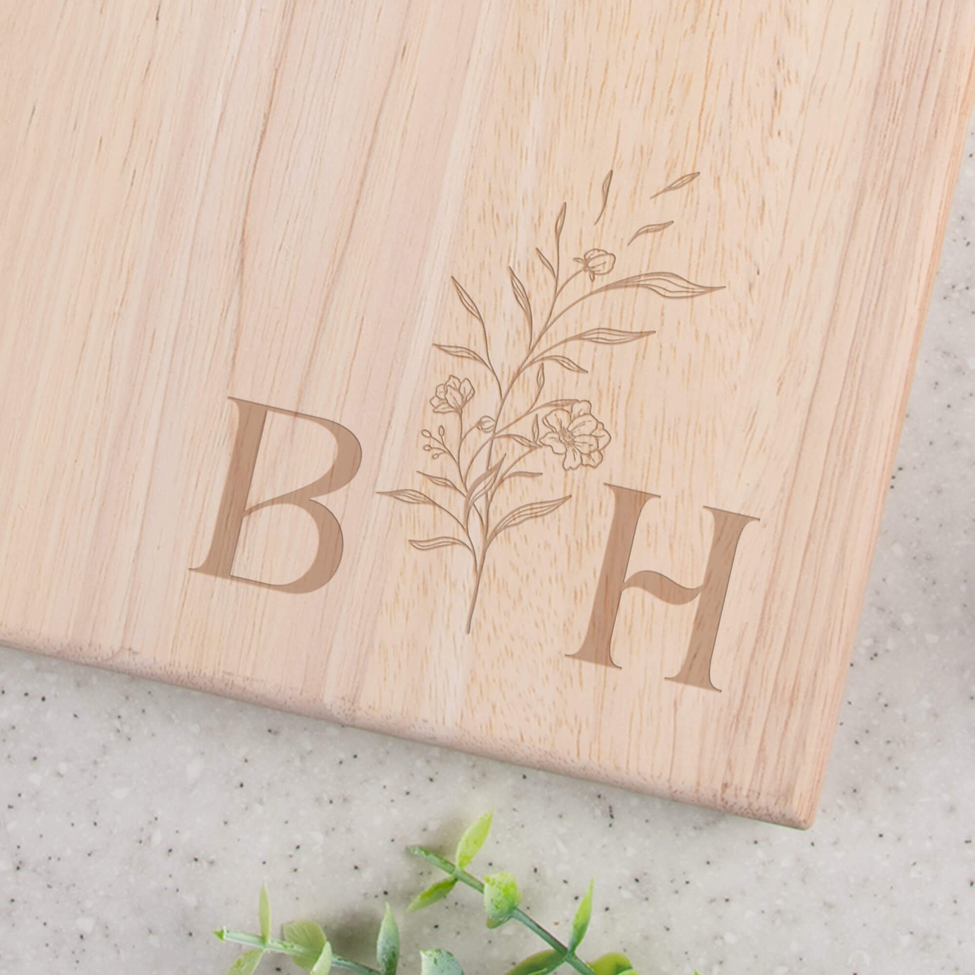 Personalized Floral Initial Paddle Serving Board closeup of design on bottom right corner
