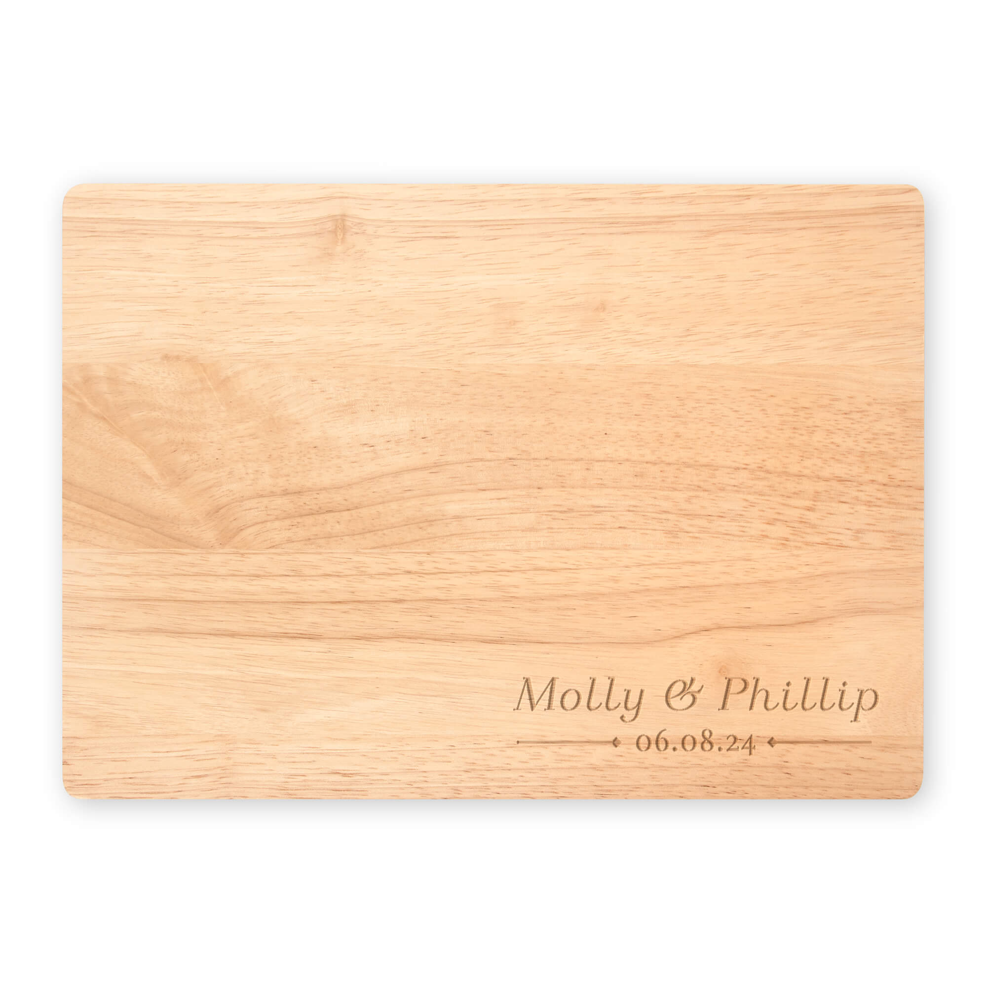 Flat lay of personalized maple cutting board engraved with “Molly & Phillip” and wedding date, shown on a white background for product display.