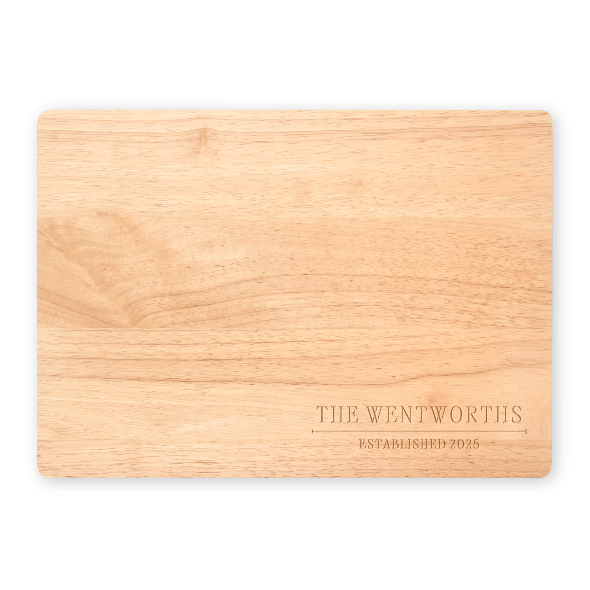Engraved maple cutting board featuring 'The Wentworths Established 2025' displayed on a white background for product showcase.
