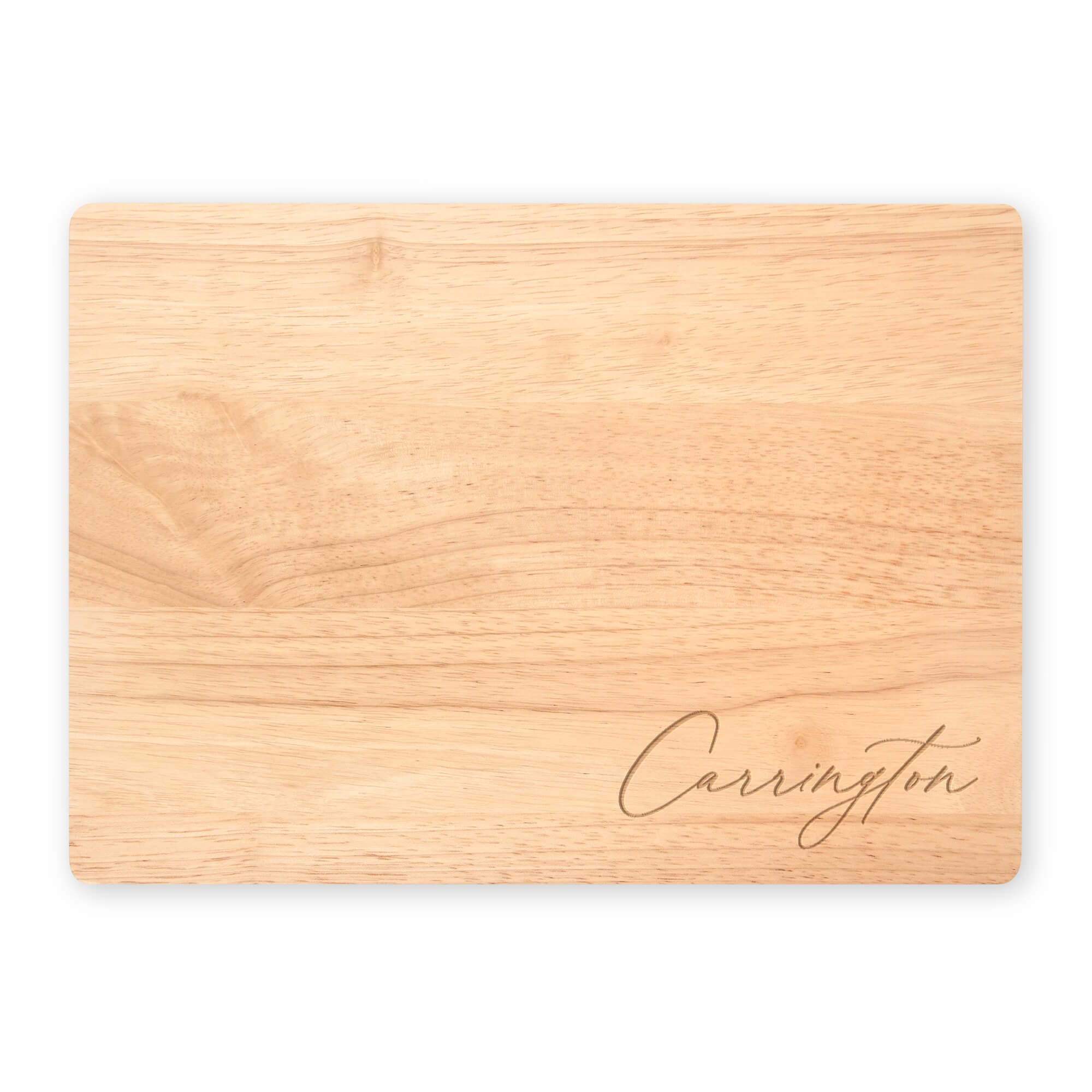 Personalized maple cutting board engraved with “Carrington” in elegant script. Custom name cutting board for kitchen décor, housewarming, or wedding gift.