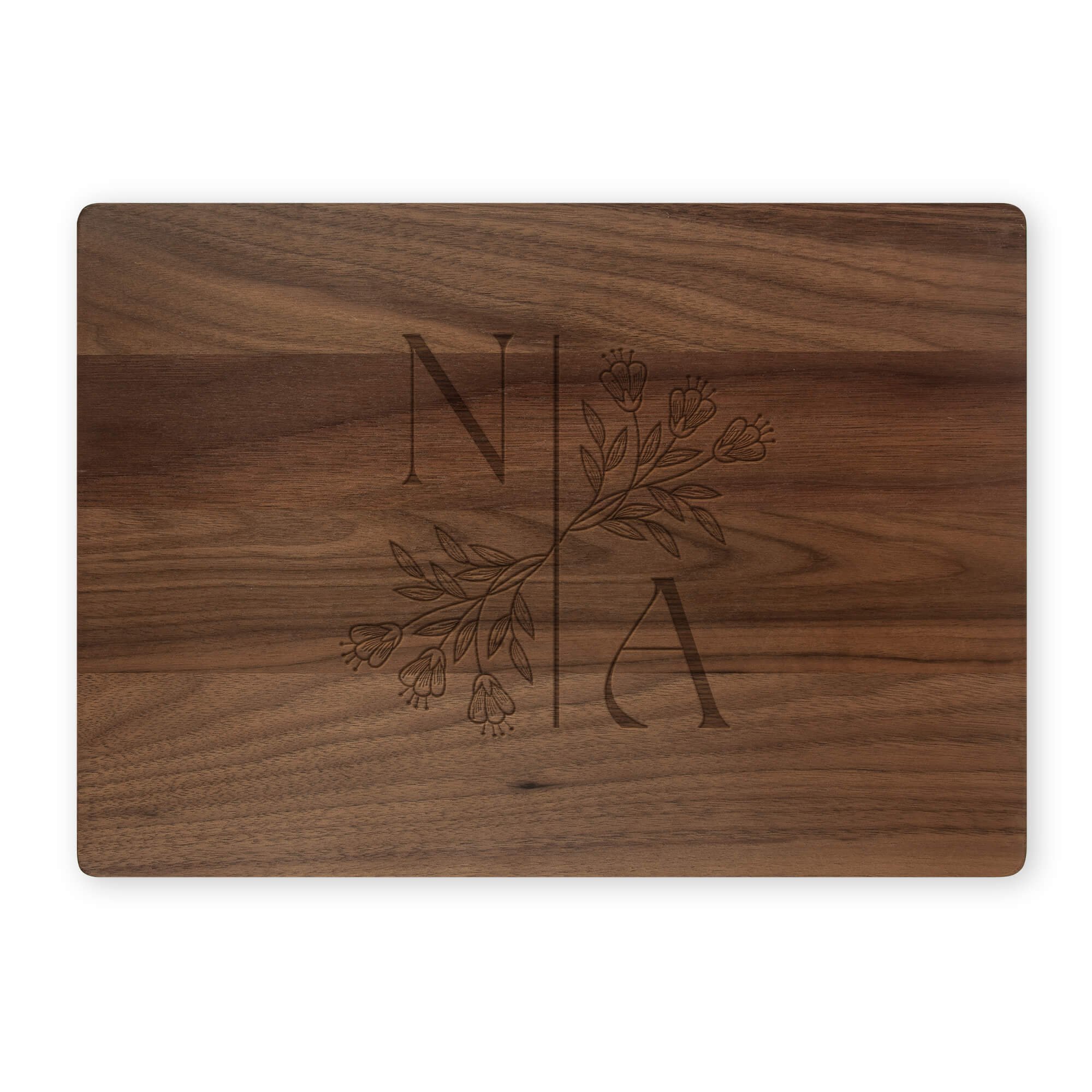 Walnut cutting board with classic monogram on white background
