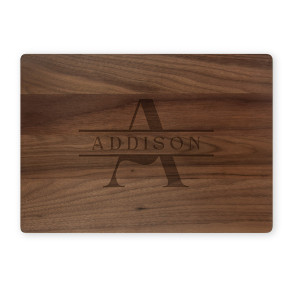 Walnut cutting board with classic A and ADDISON monogram on white background