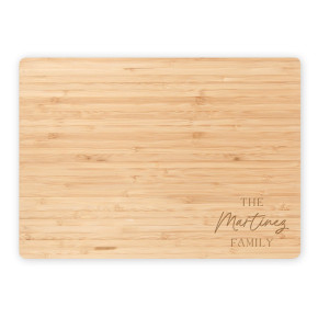 Custom Family Script Engraved Bamboo Cutting Board on white background