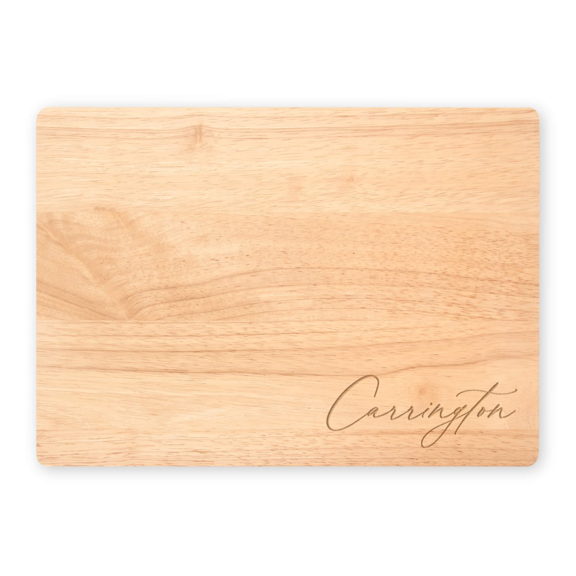 Personalized maple cutting board engraved with “Carrington” in elegant script. Custom name cutting board for kitchen décor, housewarming, or wedding gift.